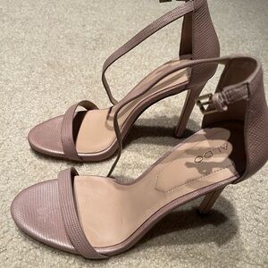 4-inch heels from Aldo in size 8.5. The color is nude or blush. Originally $80.